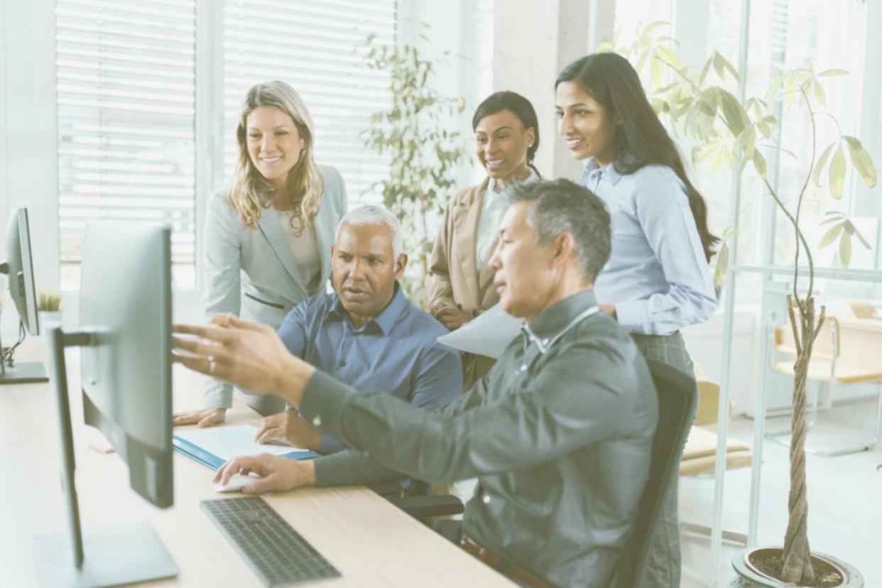 SEO analytics dashboard on laptop screen showing keyword performance metrics